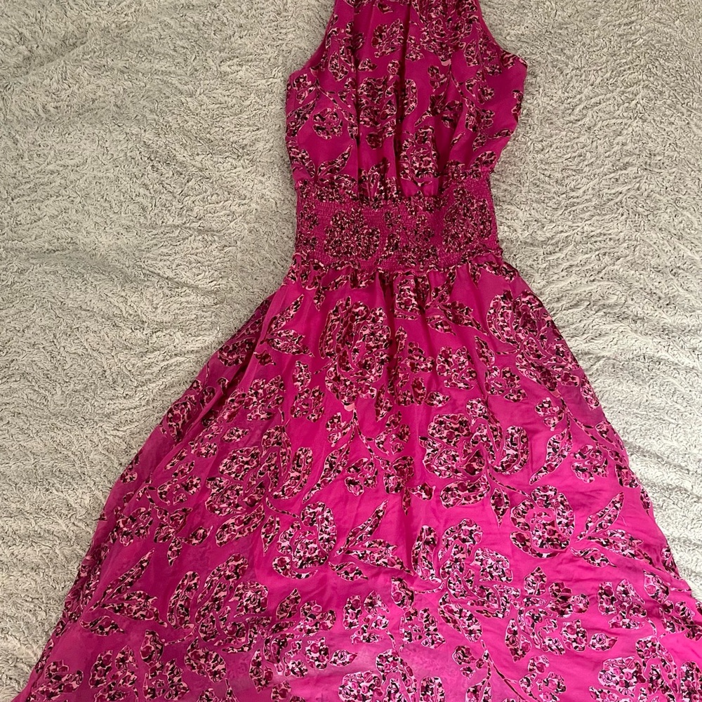 High neck dress with floral detail. Cinched waist makes it super flattering.
